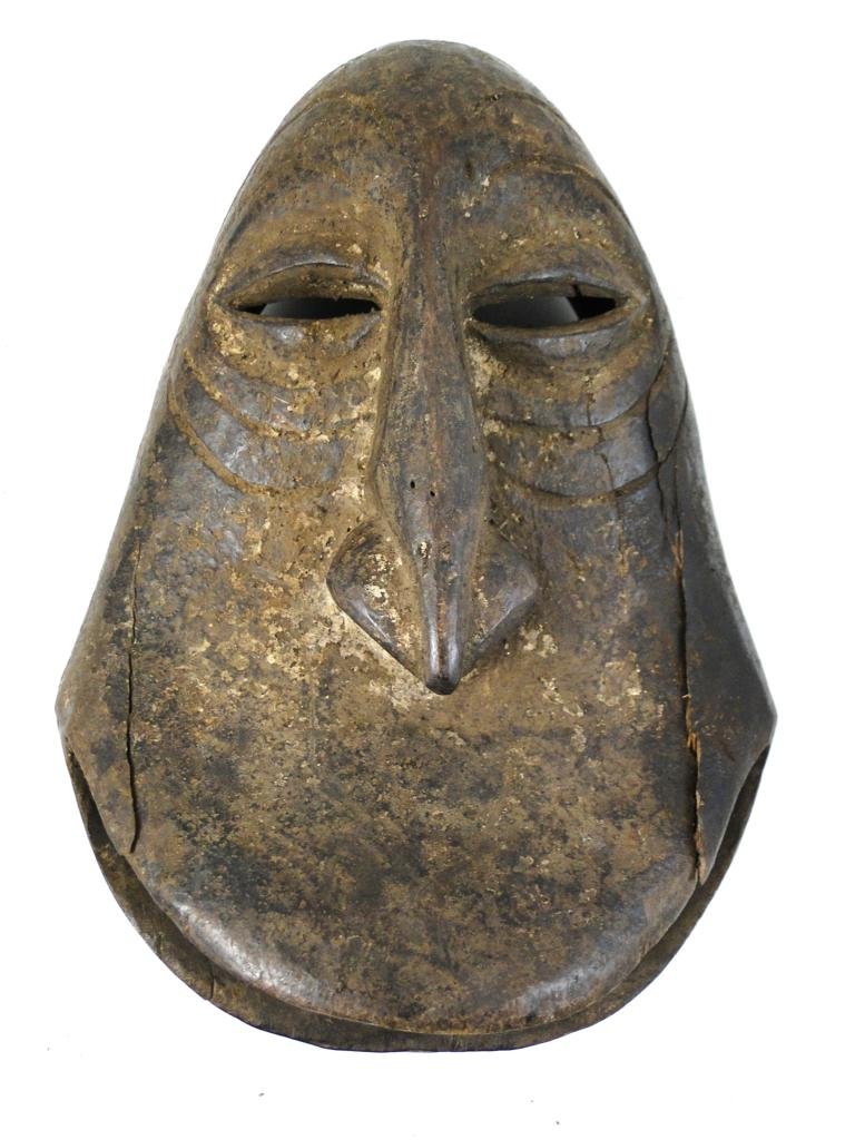 Soko Mutu Funeral Mask, Hemba tribe, from Congo, o: Soko Mutu Funeral Mask, Hemba tribe, from Congo, obtained in Tanzania, 2008, This well used Soko Mutu mask appears in several sizes, measures 10"Hx7"Wx6"D, est. value 800.