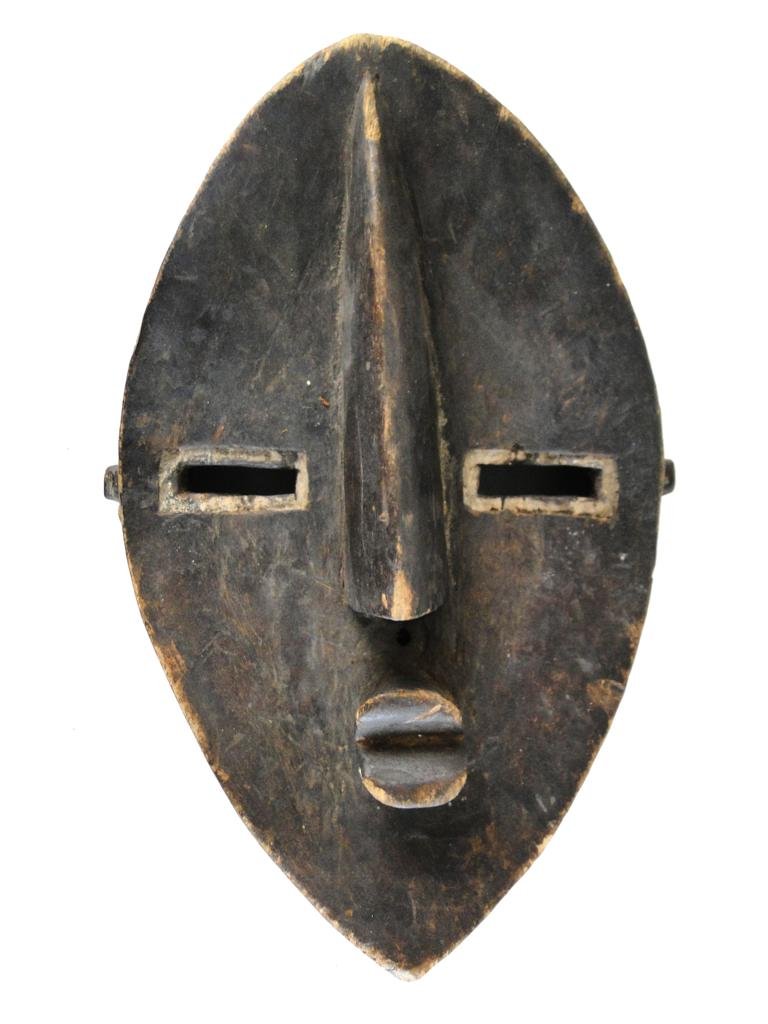 Face Mask, Lulua tribe, from Congo, obtained in Wa: Face Mask, Lulua tribe, from Congo, obtained in Washinton DC, 1979, Cubist shape unique and symetrical, measures 17"Hx10"Wx5"D, est. value 300.