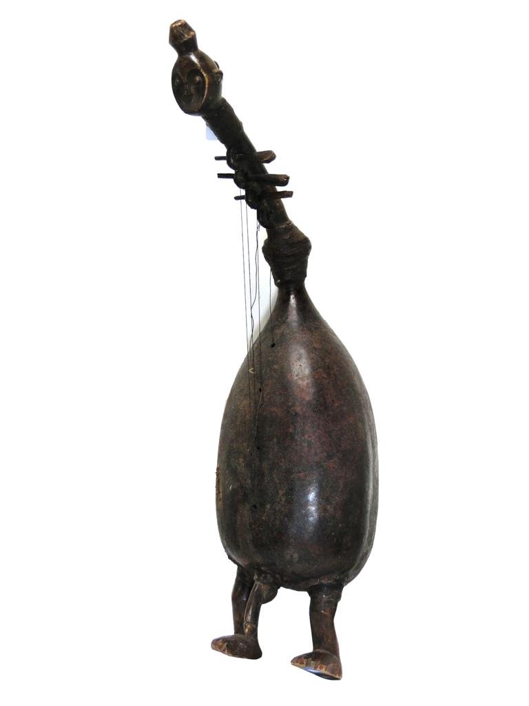 Harp, Fang tribe, from Gabon, obtained in Camaroon: Harp, Fang tribe, from Gabon, obtained in Camaroon, 1971, Rare artifact quality Fang harp, measures 37"Hx9"Wx11"D, est. value 2500.