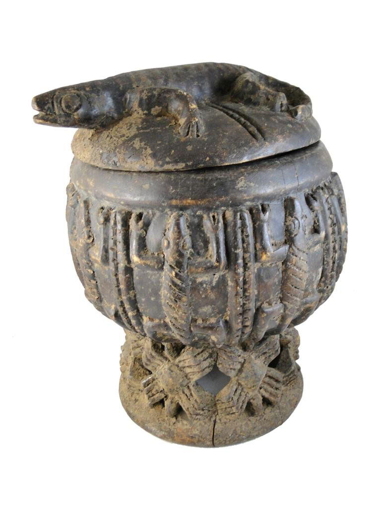 Storage Pot, Bamileke tribe, from Cameroon, obtain: Storage Pot, Bamileke tribe, from Cameroon, obtained in Washington DC, 1984, Base carving kept the bowl portion with food kept off the ground, measures 15"Hx11"Wx11"D, est. value 200.