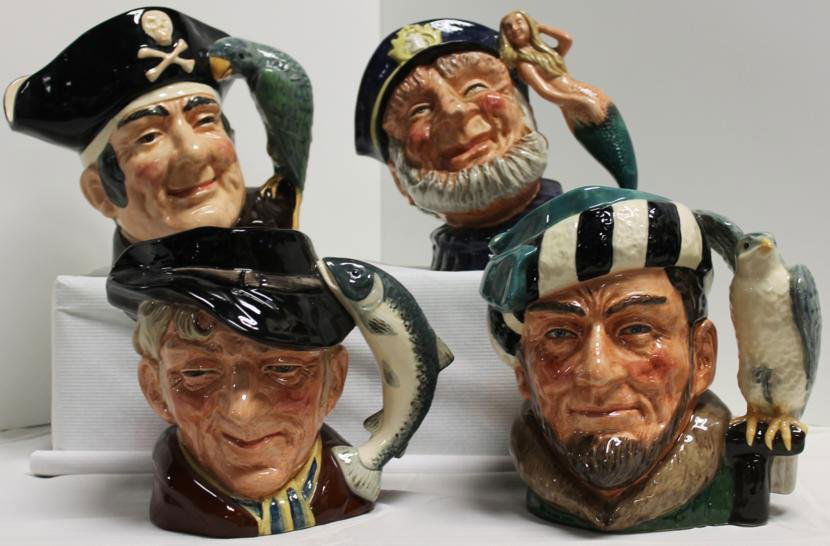 Lot of four Royal Doulton Toby mugs. 1.) Long John: Lot of four Royal Doulton Toby mugs. 1.) Long John Silver. Limited. 1951. D6335. Contemporary mark. 2.) "The Falconer D 6533 Limited 1959.Old mark 3.) "Old Salt" D6551. Approx. 8" Contemporary mark. 4