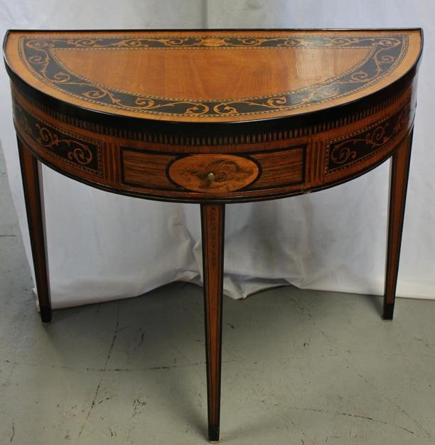 George III inlaid ebony, satinwood, and penwork de: George III inlaid ebony, satinwood, and penwork demilune table, circa 1800. Height 28”, Width 32”, Depth, 16”.