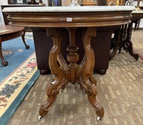 Victorian Oval White Marble Top Parlor Table with Elaborate Floral Carved Walnut