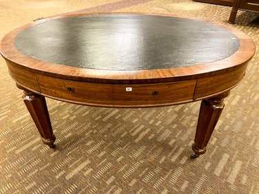 A Victorian Oval Library Table