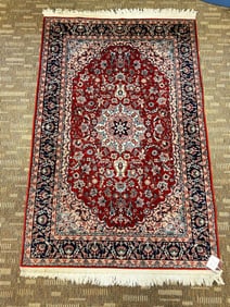 KESHAN finely knotted Persian extremely detailed rug depicting a floral center w