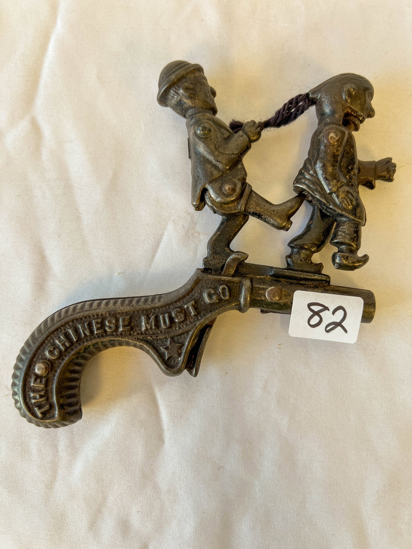 Rare Cast Iron Victorian Mechanical Cap Gun with Moveable Figures: Extremely rare original cast iron antique cap gun. This rare mechanical cap gun is in original working condition and the figures on the top move. Measures 5" by 4".