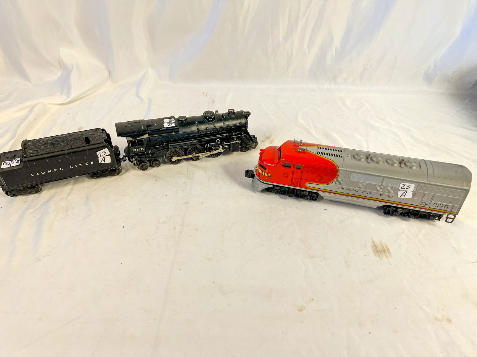 Lionel Santa Fe Engine along with a Lionel 2025 Engine with Coal Car (1 of 5)