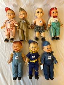 Seven Mickey Effanbee Vinyl Dolls in Various Uniforms