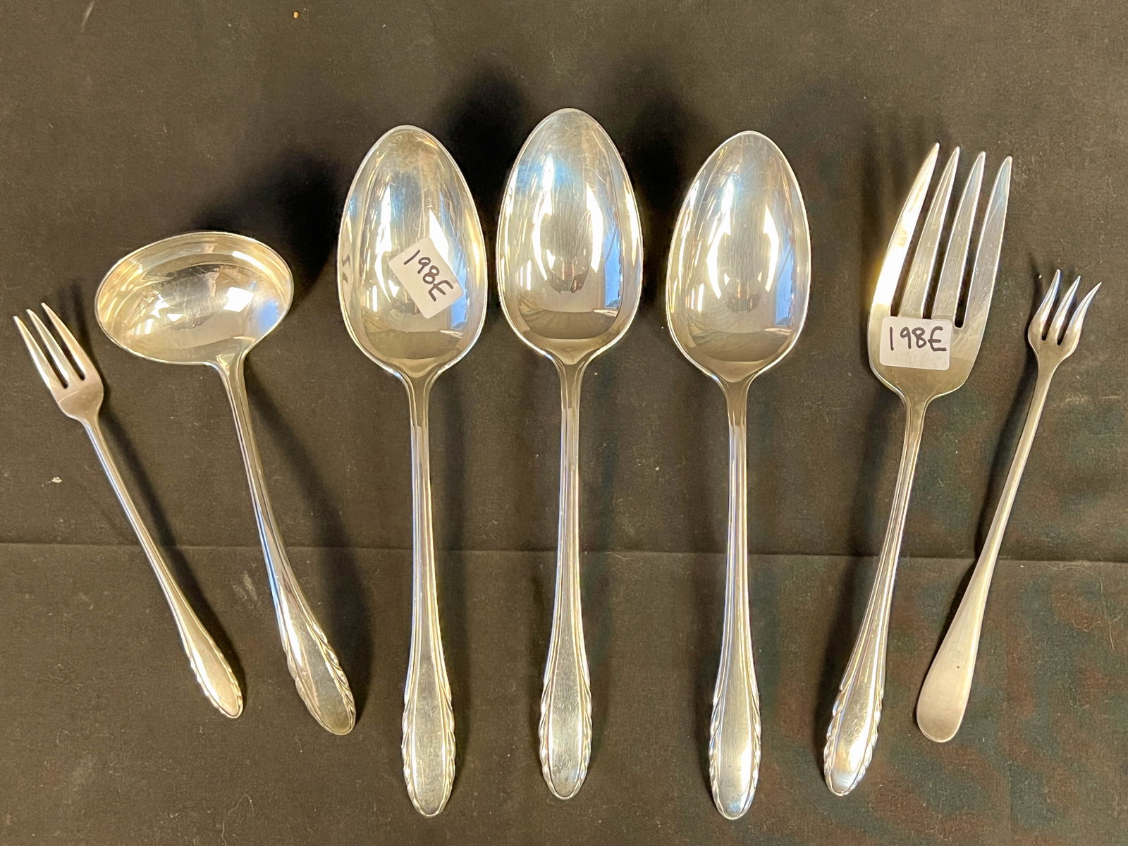 Sterling by R Gorham in the Pattern 'Lyric' - Serving Pieces Only: Sterling by R Gorham in the pattern 'Lyric' to include 1 sauce spoon (62g), 3 large serving spoons (216g), shrimp fork and an olive fork (32g), a large serving fork (70g) Total weight is 380g