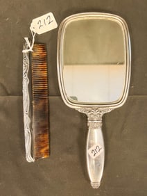 Heavy Sterling Silver Hand Mirror with Floral Decorations along with a Sterling