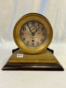 Chelsea Bronze and Lacquered Wood Clock; comes with a Small Booklet on Chelsea