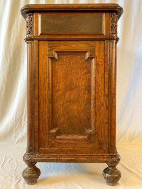Flamed Mahogany End Table Cabinet with Carved Corners and Bun Feet.