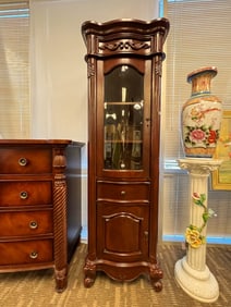 Serpentine Beveled Glass Display Cabinet in Mahogany with Drawer and Cabinet Base