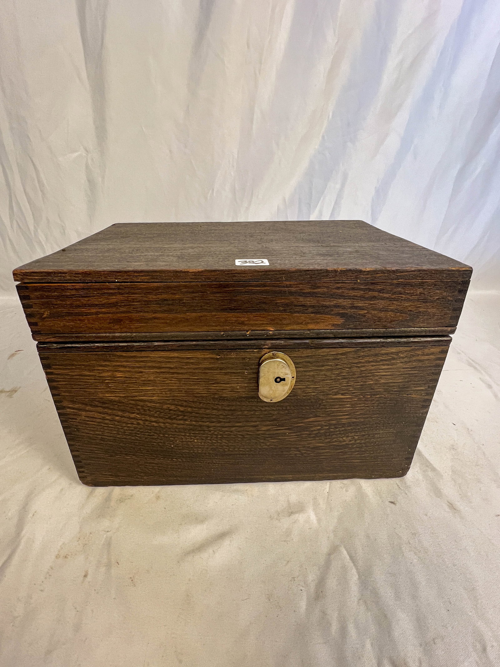 Oak Porcelain Lined Humidor: Oak porcelain lined humidor with a clay top. Measures 8" tall by 8" across by 11" long