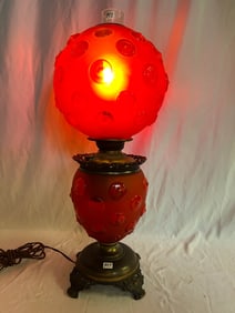 A Large Red Satin 2 Part Oil Lamp with Bullseye Pattern