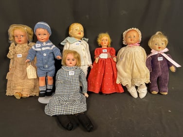 Seven Antique Composition and Other Dolls