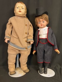 Two Very Large Composition and Paper Mache Boy Dolls in Period Clothing