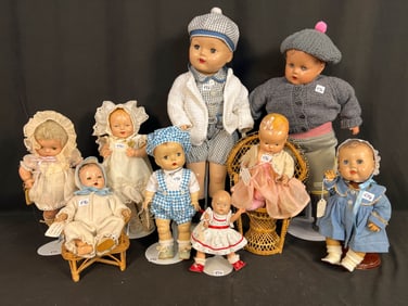 9 Composition Baby Dolls and Boy Dolls All in Fancy Dress