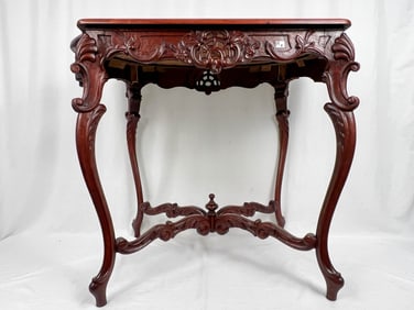 Serpintine Top Table of Elaborate Floral Carvings with Heavy Burled Oval Middle Carved Stretcher