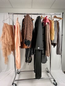 Mannequin in 1930's day dress along with silk shawl, lederhosen and more