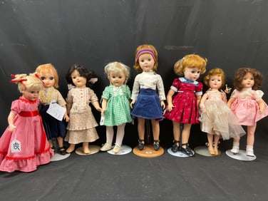 Lot of Eight Vintage Dolls in Clothing.