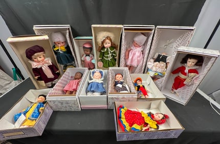 Lot of 13 Boxed Dolls