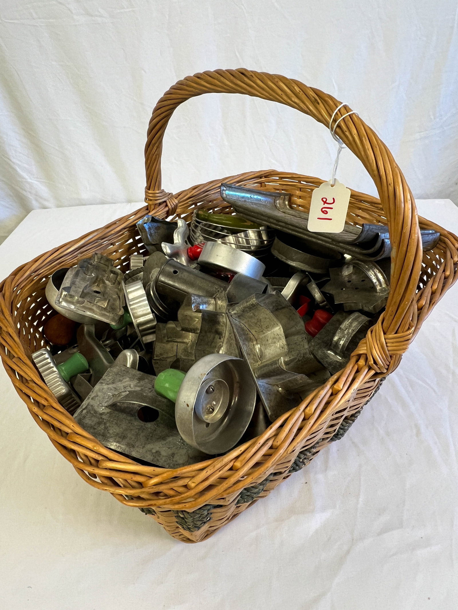 Antique Basket filled with Cookie Cutters (1 of 2)