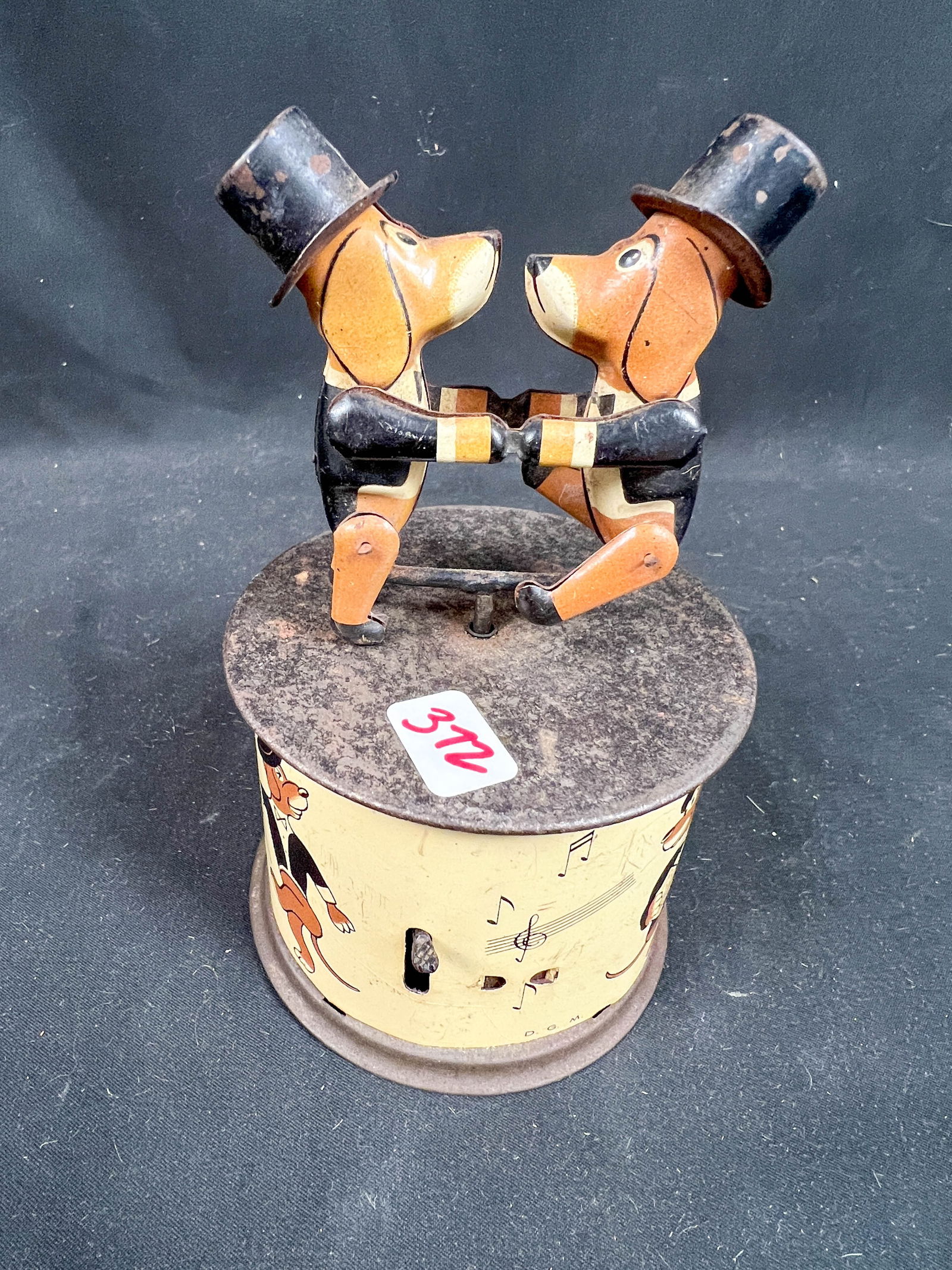 Antique toys to include tin lithograph dog, Shoenhut Donkey, blue willow child's tea set and a (1 of 7)