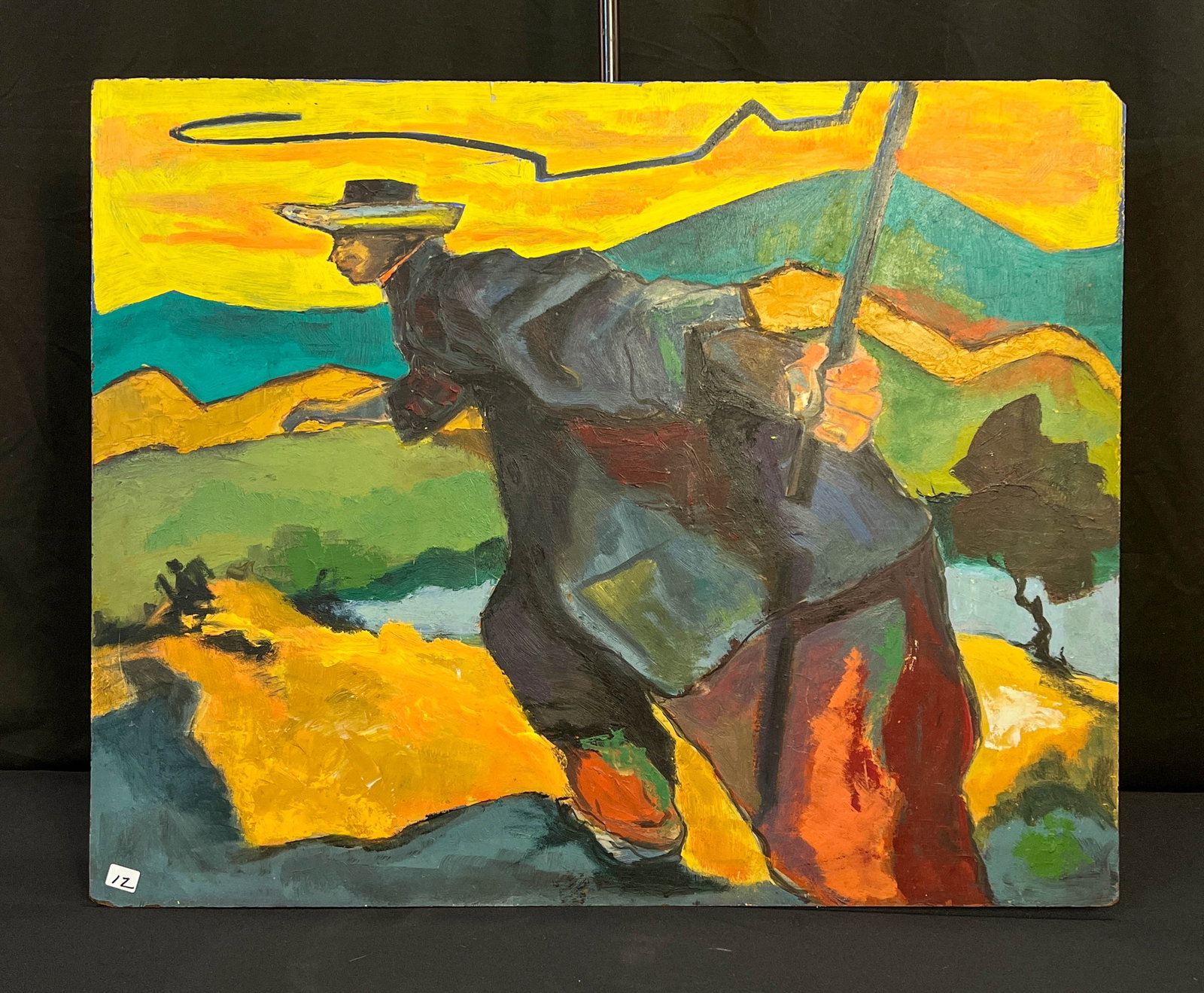 Anderson Oil on Masonite of a Mule Skinner C.1940: This vibrant, quality framed oil on masonite is signed Anderson on the reverse. It depicts a mule skinner carrying a whip and looking out over a valley with bright colored mountains in the background.