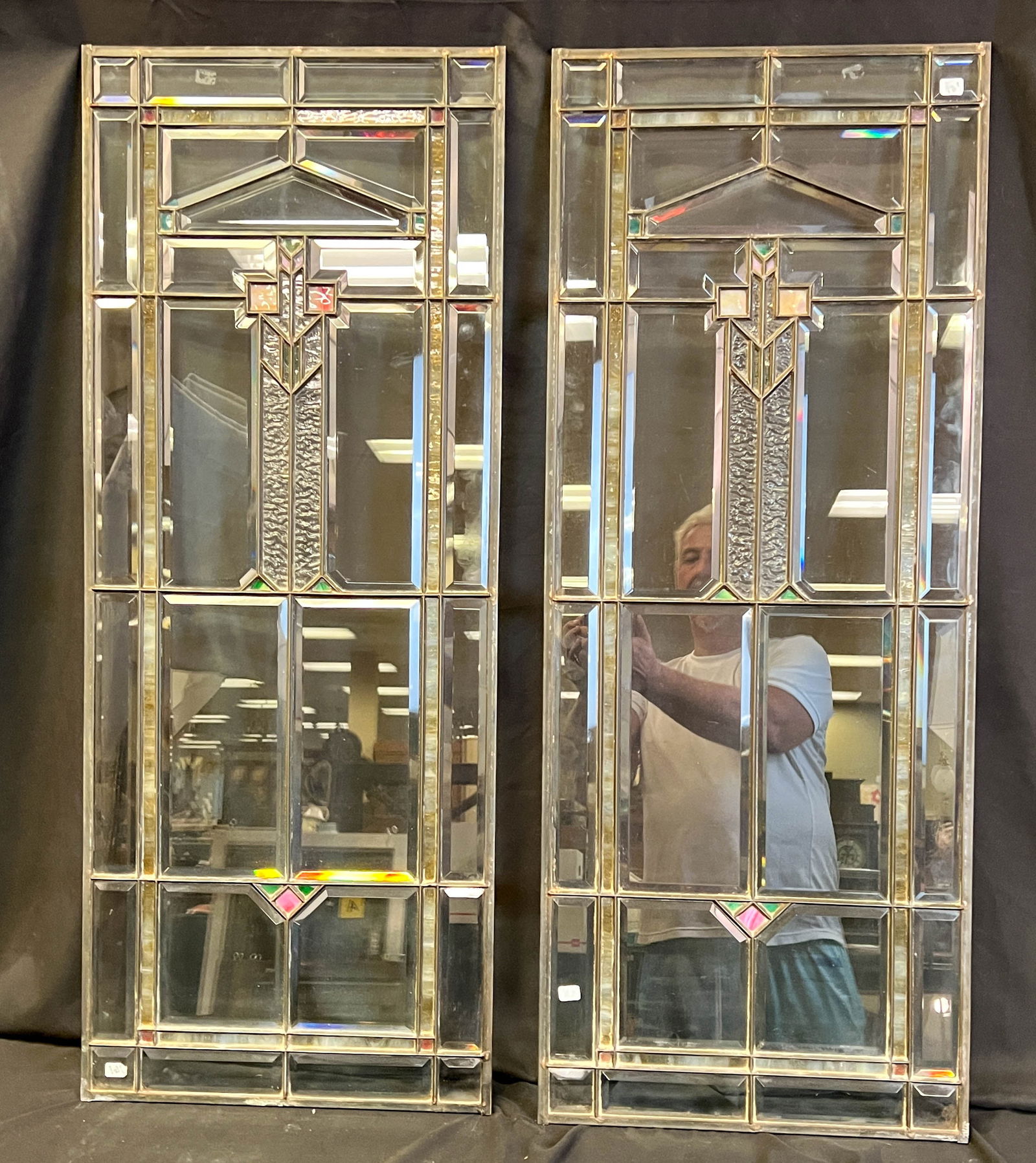 Pair of Art and Crafts Beveled and Stained Glass Sidelights: A pair of beautiful matching Arts and Crafts sidelight windows. These high quality sidelights feature beveled glass, frosted glass and prairie style design with green and pink glass accents. This outs