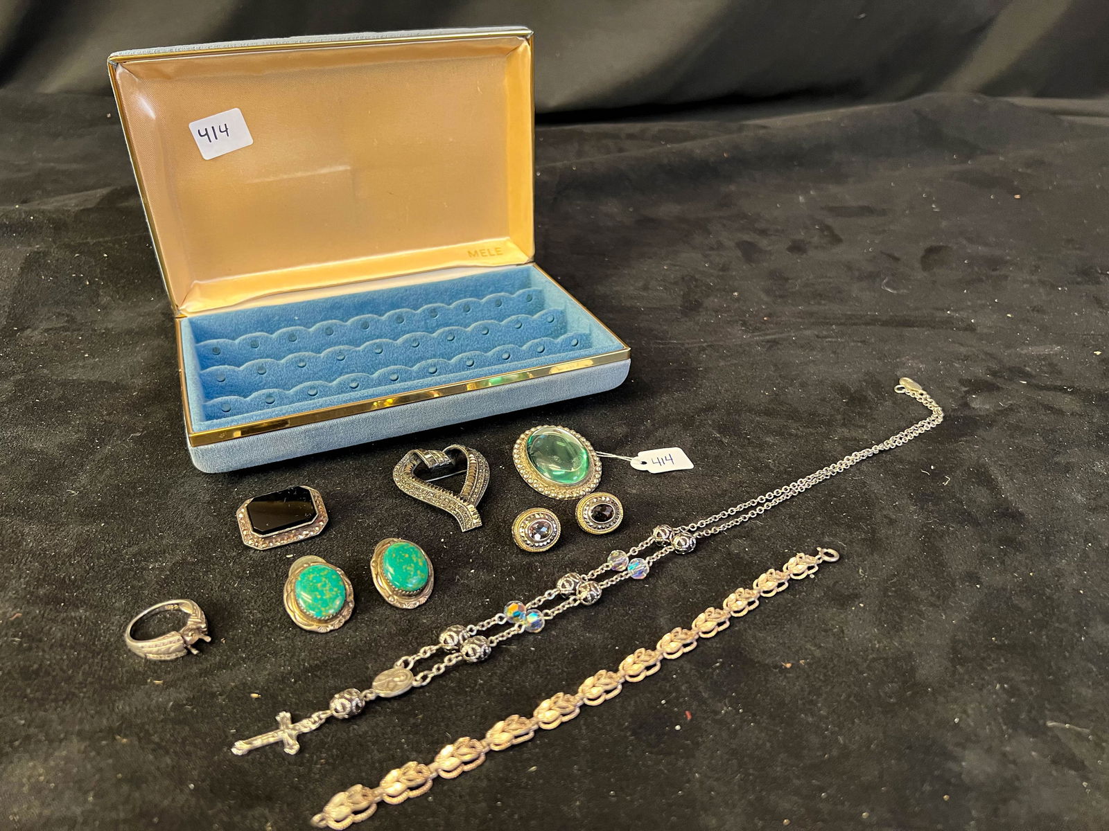 Lot of Sterling Jewelry to include Navajo: A lot of sterling jewelry to include signed navajo turquoise earrings, 3 brooches with stones, a 1920's filigree sterling wedding ring with no stone, and signed tjm smokey topaz earring with other jew