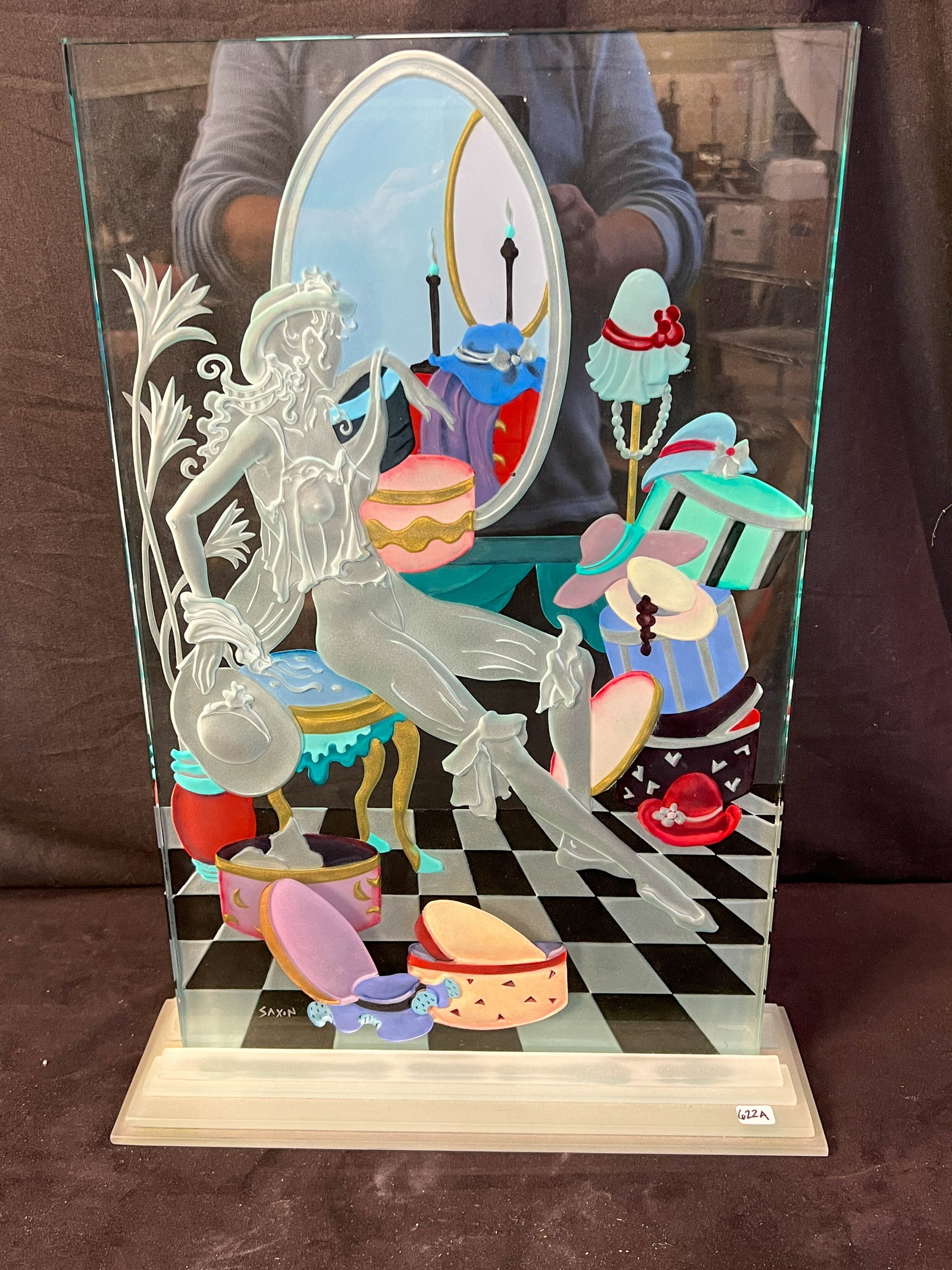 Intaglio Art Glass Panel on Stand Signed Saxon: An intaglio cut art glass sculpture panel by Wendy Saxon Brown. Piece is in excellent condition and dates to the 20th century. It measures 21" tall X 15" across X 4.5" deep.