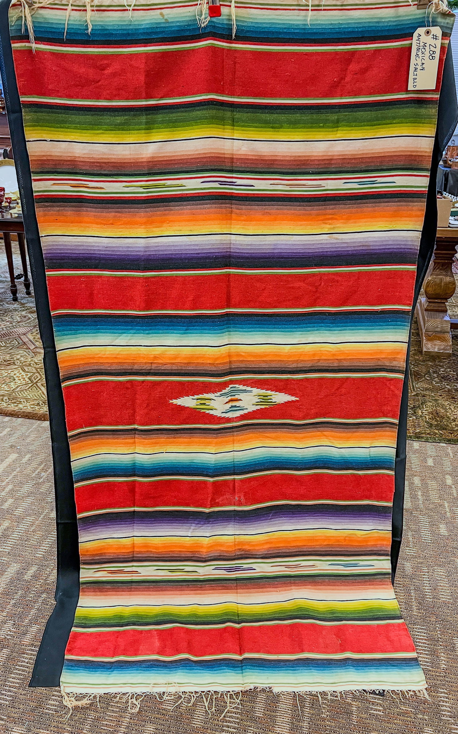 Antique Hand Woven Wool Saltillo Blanket/Serape c.1920's: A 1920's serape blanket with vibrant colors and of important size. This piece measures 76" X 38".