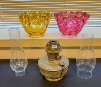 Group to include Cranberry Ruffled Shade, Amber Coin Spot Shade and Oil Burners
