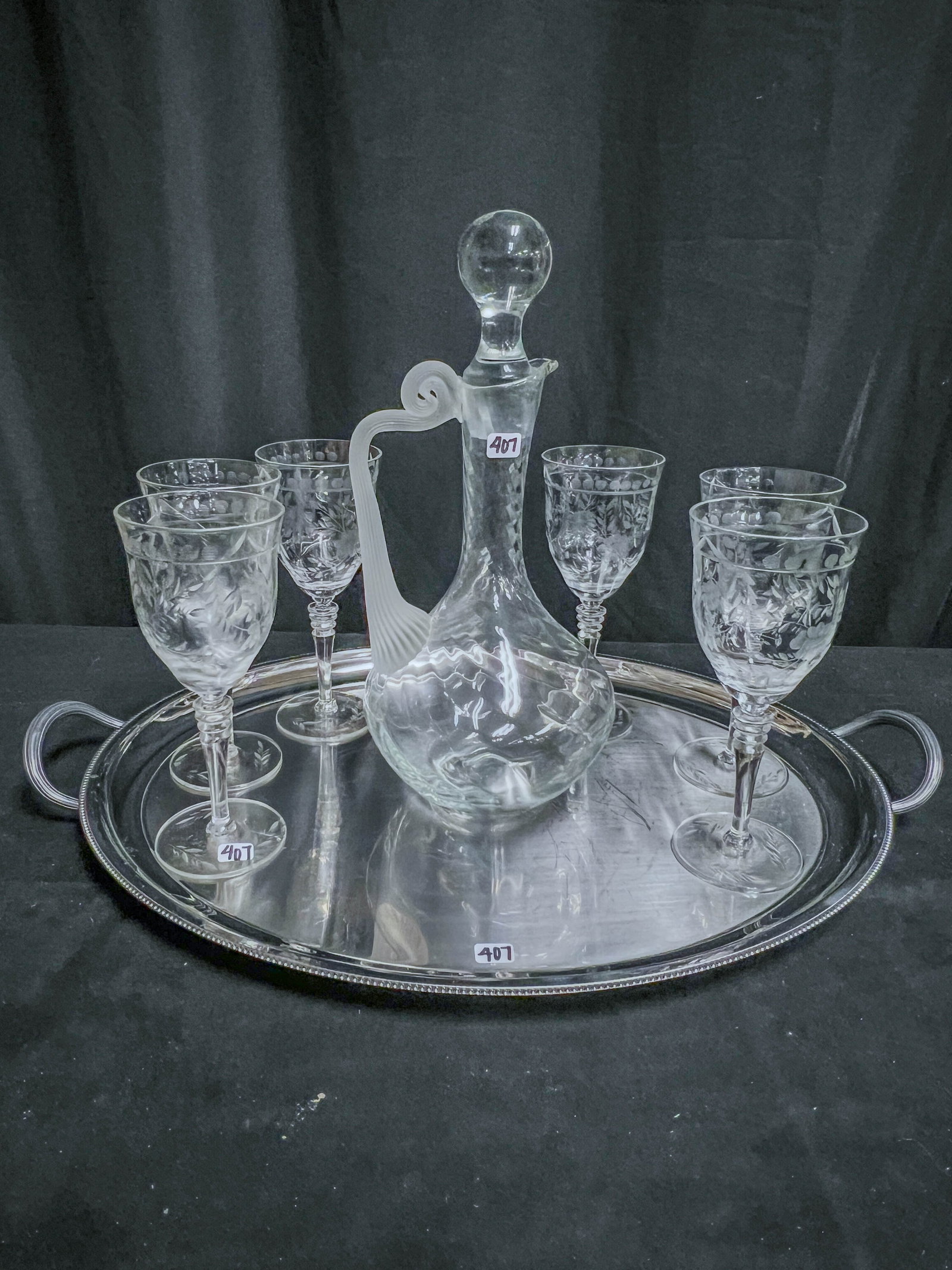 Crystal Decanter, 6 Wheel Cut Goblets, Waterford tumblers and more.: This wine set consist of 6 wheel cut crystal wine goblets, crystal decanter with a swirled satin handle, and a steel 2 handles tray.