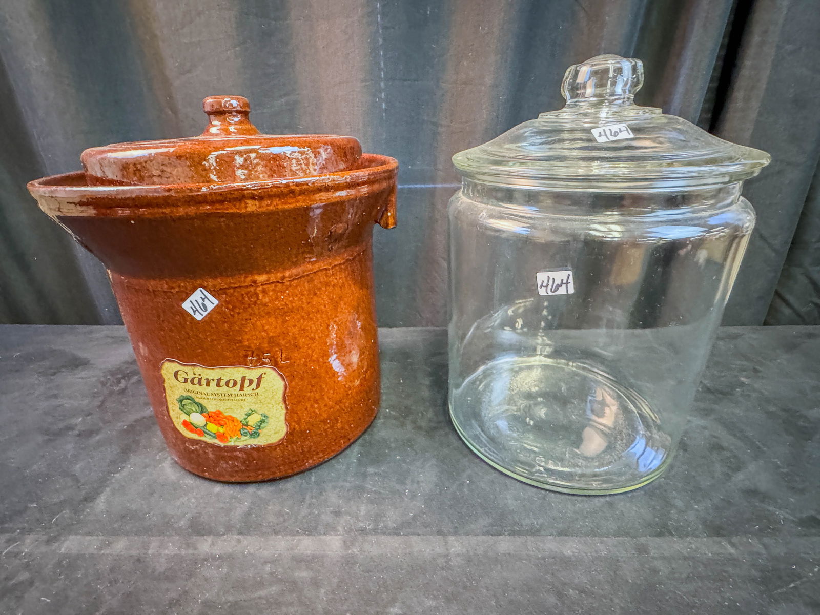 Covered Store Counter Jar and Sauerkraut Crock: An oversized covered store counter jar and a brown glazed sauerkraut crock.