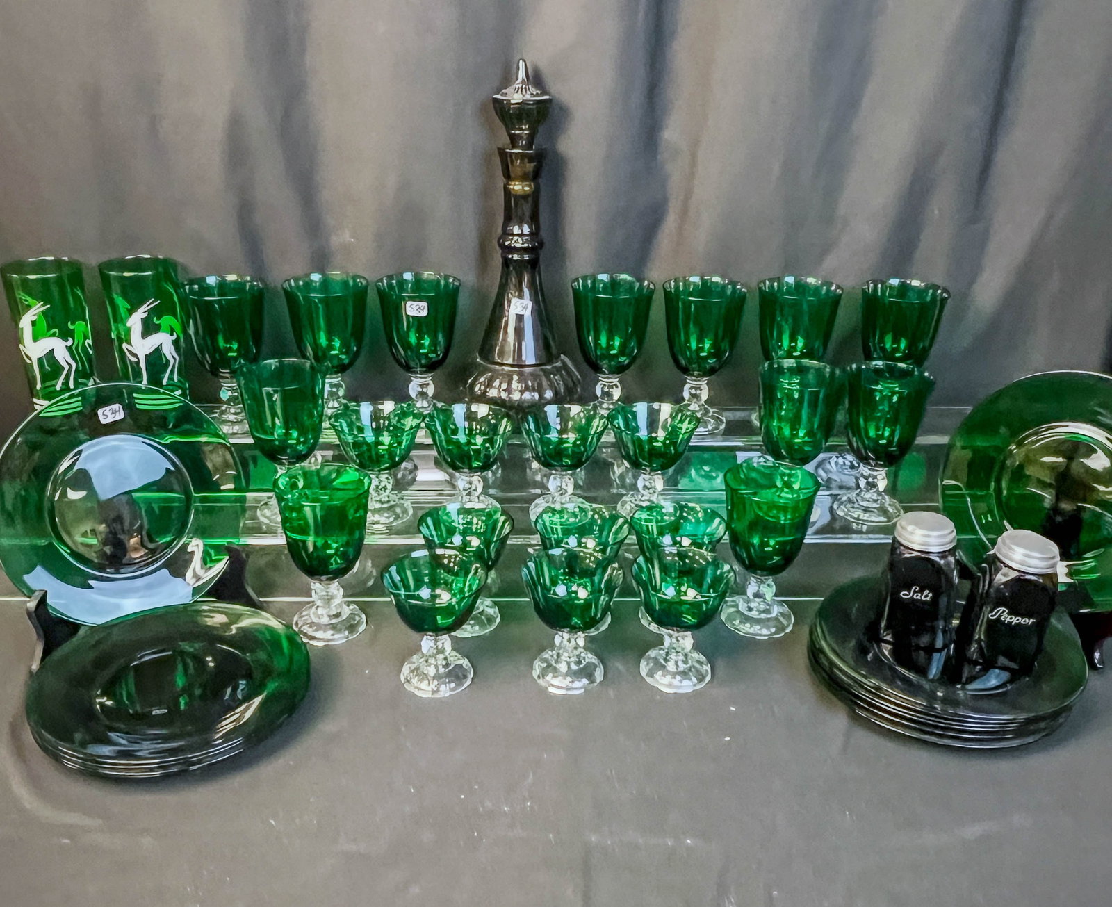 Fostoria "Colonial Dame" Emerald Green Wine and Cocktail Glasses, More!: This Group of colored glass includes a collection of Fostoria "Colonial Dame" emerald green glasses to include 12 goblets, and 10 footed champagnes, along with 12 8.5" luncheon plates, a Viking glass 