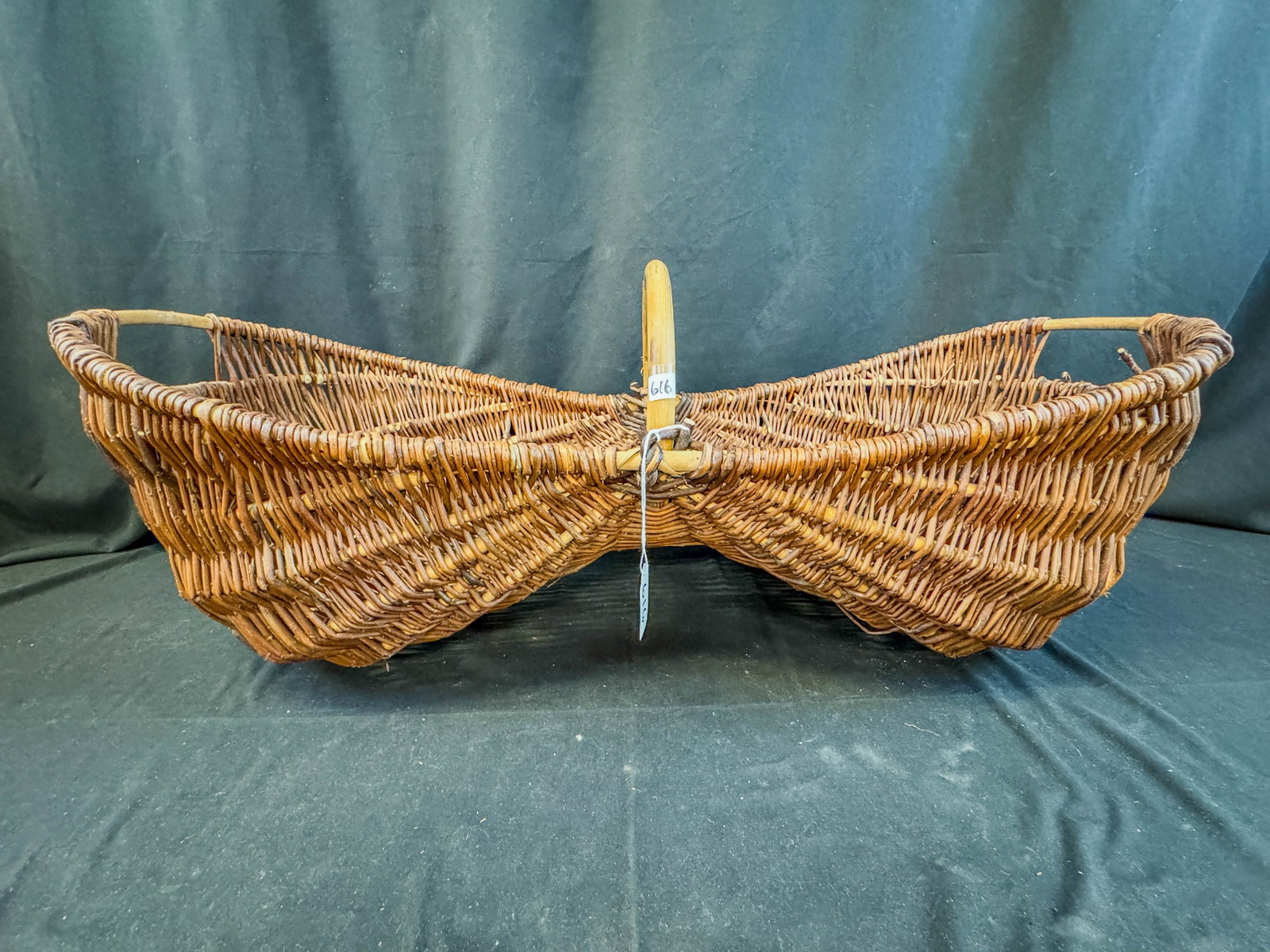 Double Sided Willow Buttocks Basket with Wood Handle: Double Sided Willow Buttocks Basket with wood Handle. 32" L x 14"w