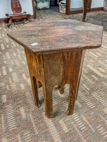 An oak hexagon plant table
