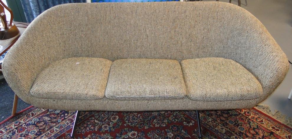20th century modern three cushion sofa with chrome legs: 20th century modern three cushion sofa with chrome legs and egg shape sides in the style of George Nelson. Est Value $600-800. Measures "74 wide x "29 tall