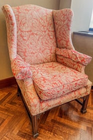 Early English Wingback Chair with Mahogany Feet and Fancy Carvings