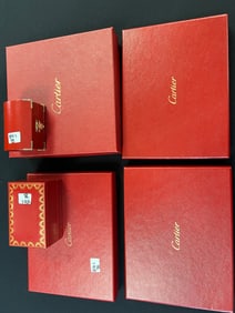 Six Cartier Boxes