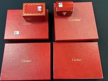 Six Cartier Boxes