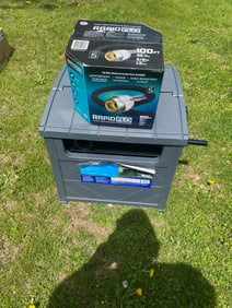 Garden hose New in Box and Hose Reel