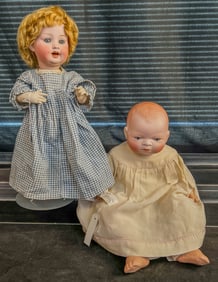 2 Antique Bisque Head Dolls , Bye Lo, and P.M.