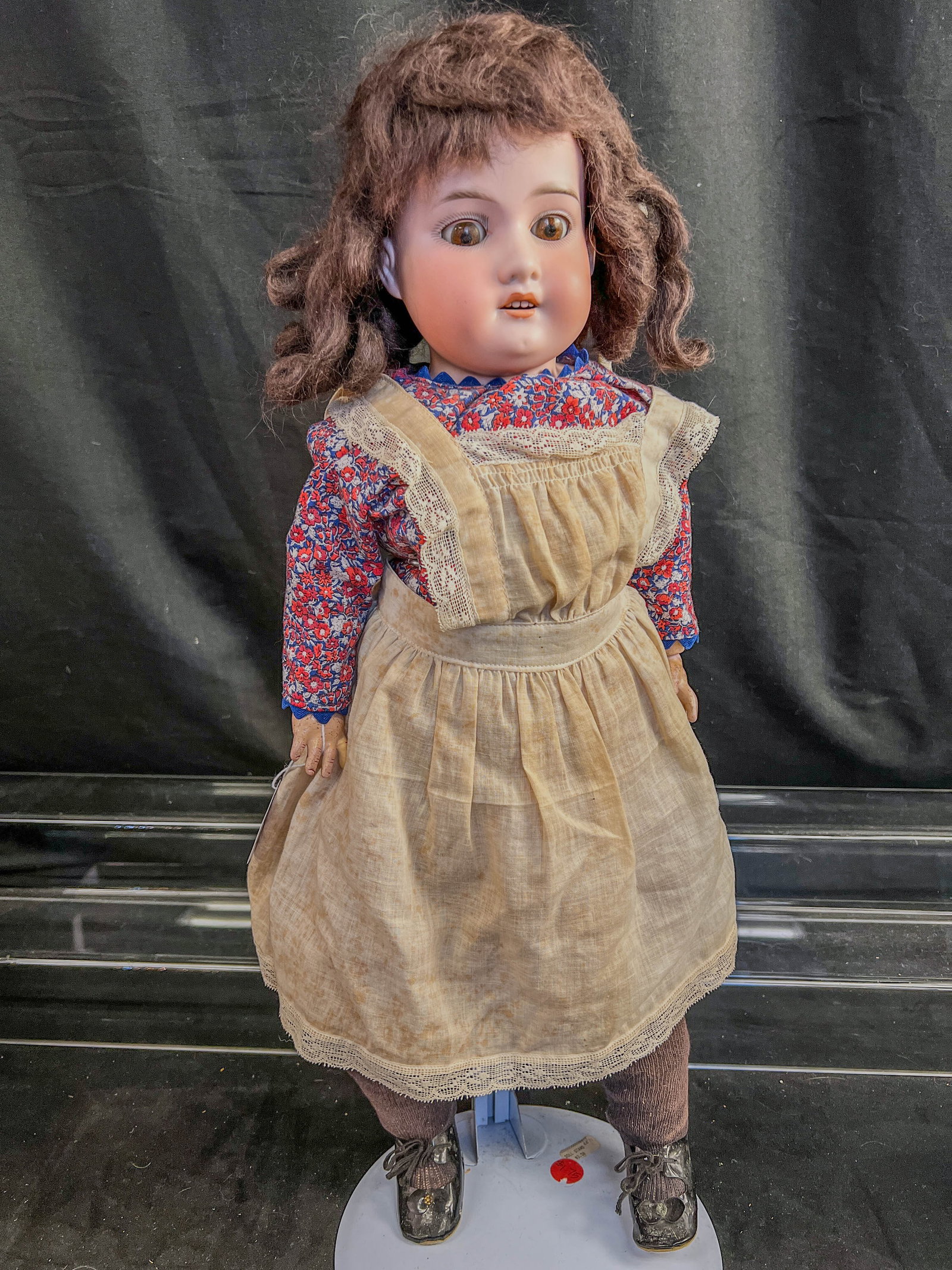 4 Antique German Bisque Head Dolls, Armand Marseille: 4 Antique German Bisque head dolls with open mouths to include a 22" Armand Marseille AM 370 sleep eye with cloth body and jointed compo arms and legs in a period pinafor (eyes don't fully close), a 2