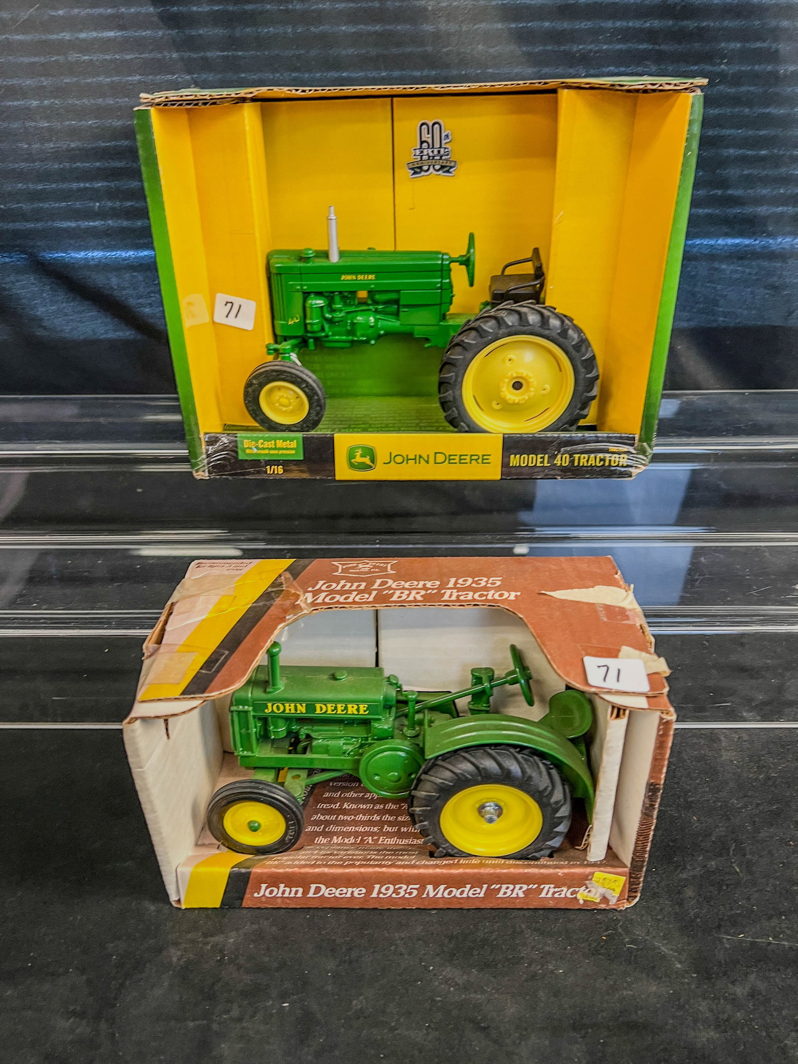 2 Ertl John Deere1/16 Scale Die Cast Metal Farm Toys< Model 40, Tractor and Model 1935 "BR" tractor: 2 Ertl John Deere1/16 Scale Die Cast Metal Farm Toys to include a Britains Series green 1953 Model 40 #15600 , Tractor and Model 1935 "BR" tractor #5586 c.1980's. Both in original boxes. BR tractor bo
