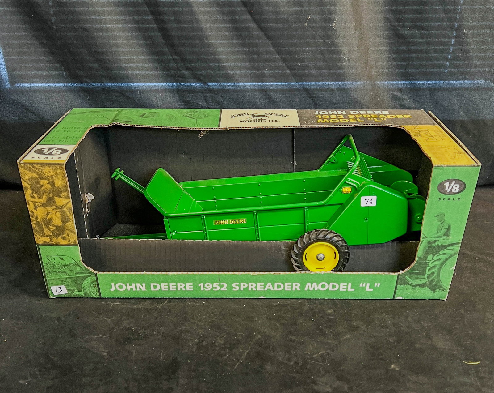 Ertl 1/8 Scale Die Cast Metal Toy John Deere 1952 Spreader Model"L": An Ertl 1/8 Scale Die Cast Metal Toy John Deere green 1952 Spreader Model"L" in it's original box, excellent, unused