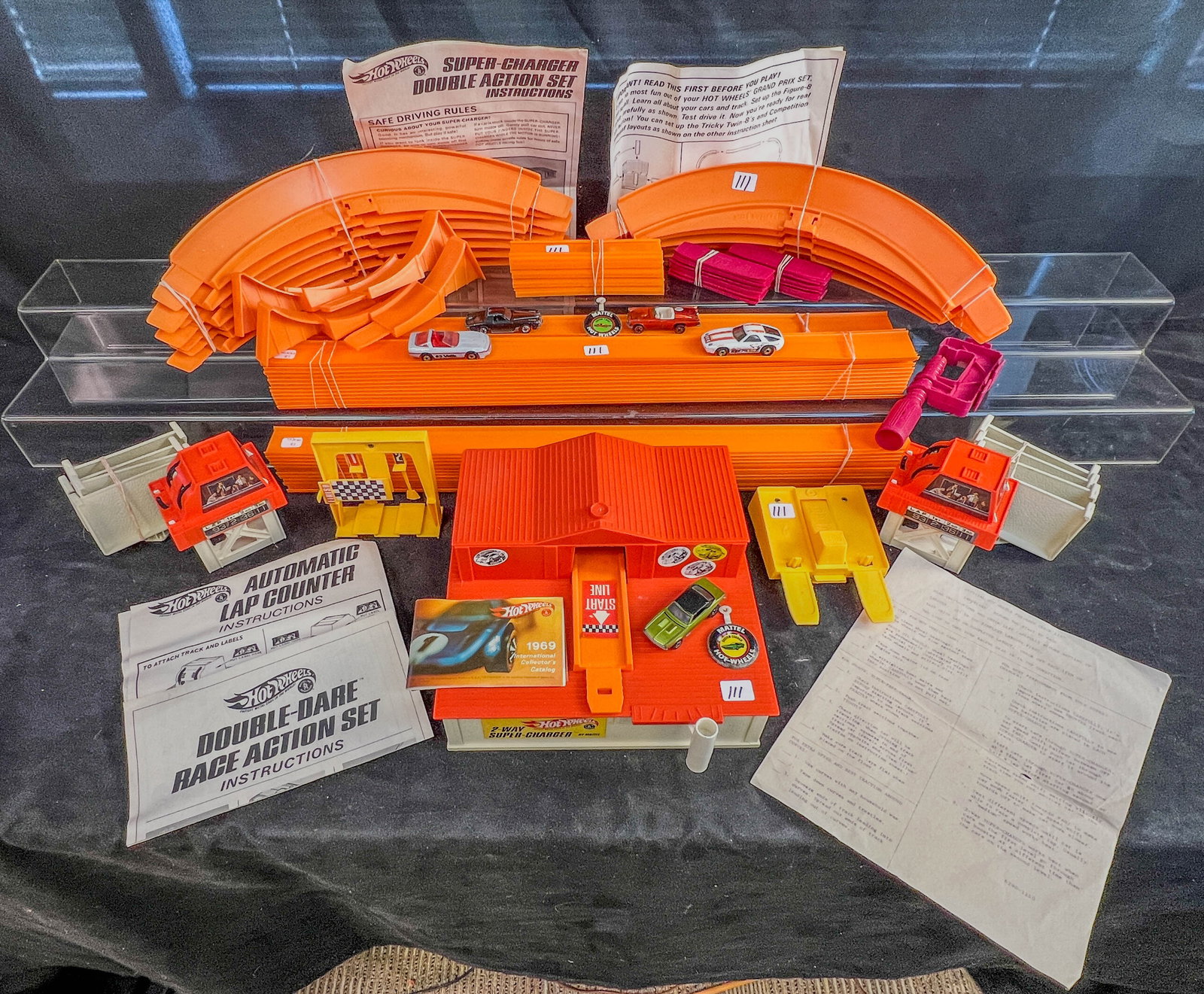 Mattel 1968 Mint Hotwheels Double Dare Race-Action Set, ^ 1969 Red Line Cars: A Mattel 1969 Mint Hotwheels Double Dare Race-Action Set and 6 -1960's Hotwheels Cars. Double dare Race Action set includes instructions, 4 way battery powered supercharger building with speed control