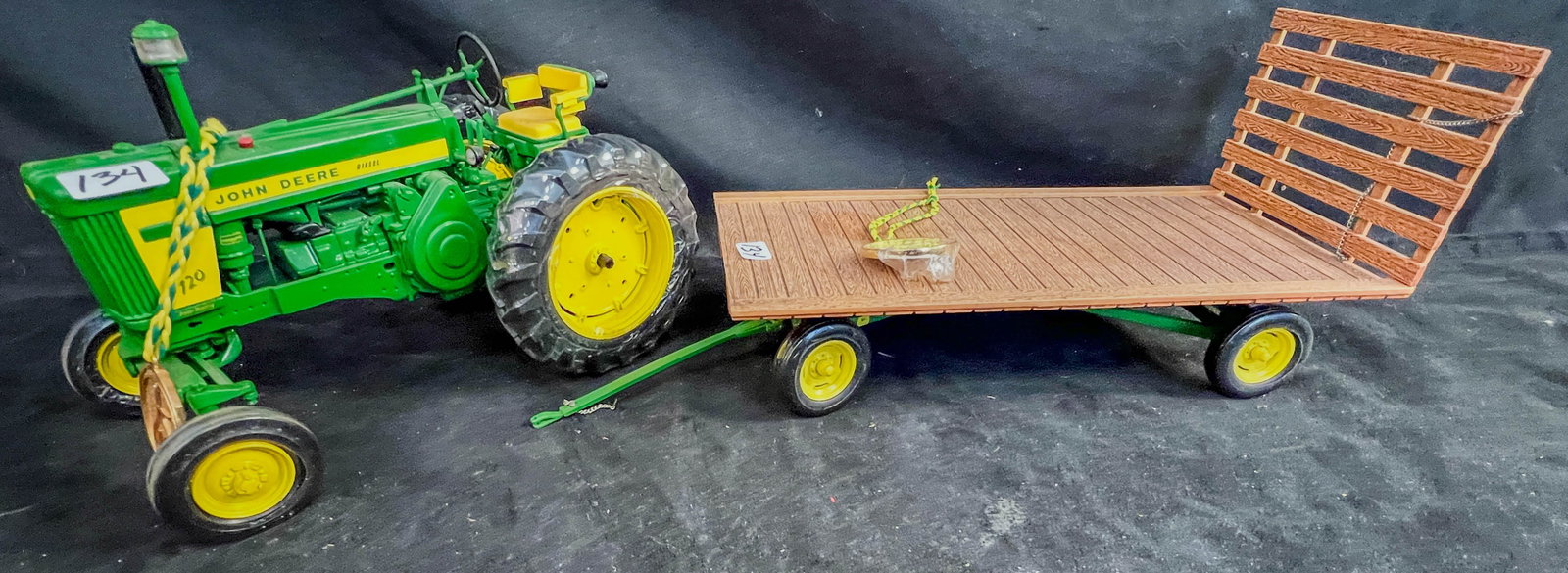 2 Ertl Precision Classic 1/16 Scale John Deere Die Cast Farm Toys, 720 Tractor, Hay Wagon: 2 Ertl Precision Classic 1/16 Scale John Deere Die Cast Farm Toys to include a green 720 Tractor with shrink wrapped wheels and precison gold coin, and Hay WagonPrecision Series 19 with shrinkwrapped